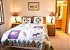 Master Bedroom Downstairs w/bath. Tastefully furnished with a Queen Bed.