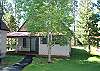 Nice wrap around deck with hot tub on the front porch.
