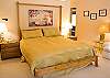 Upstairs Master King Suite. Enjoy a tranquil nights sleep in this huge master bedroom located upstairs.