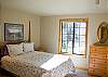 Queen Bedroom downstairs is light and bright.