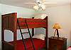 The Bunk Room has a set of Bunks and a Single bed. This room is located at the end of the hall.