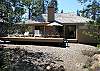 This comfortable single level home is located in a tranquil forest setting. Spend mornings watching the deer go by from the back deck or evenings under the stars in the great hot tub!!