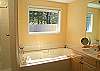 The Master Bath has a jacuzzi tub as well as a shower.