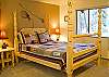 Queen Master Bedroom by Living Room