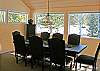 Enjoy the view and good food from this large dining room table which seats 8.