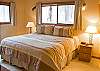The downstairs Master Bedroom features a King Size Bed and a walk-in closet.  The attached bathroom has a shower.