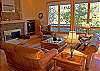This home is designed with a wonderful great room. Soaring ceilings, beautiful floors, and rustic leather furniture make this a place to remember!