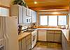 Time to cook up a great meal in this cozy kitchen.
