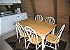 A charming wooden dining set is the perfect backdrop for special meals and moments in Sunriver!