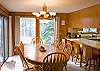 Plenty of seating with dining table and bar stools!