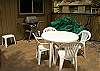 Front courtyard has seating for four and a propane Barbeque.