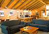 Huge great room with multiple sitting areas, a billards table, wood fire place and big screen tv. Ultimate setting for a large friendly group.