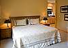 Master King Bedroom with lovely pine accents.