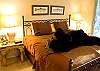 One of the three master suites.  Features a King Size Bed high quality bedding that guarantees sweet dreams.