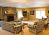 Very open and spacious living room with a wood burning fireplace. No matter how big of a family you have, you will still have plenty of room in this house