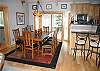 The open great room and elevated kitchen guarantee that the chef will never feel 