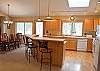 A breakfast bar so people can join in the conversation while the cook's do their magic.
