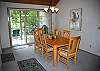 Dining area that seats six, nice breakfast bar with stools for more seating.  Deck off of dining area.