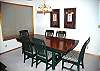 Large dining table open to the kitchen and livingroom