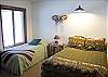 This bedroom features a Full Size Bed as well as a Twin. Bedroom is right next door to the hall bathroom.