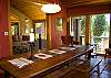 Another view of the Dining Room. This large dining table is great for large family gatherings.  Conversation and laughter will be the main course!