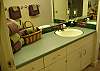 The downstairs bath serves the two downstairs bedrooms