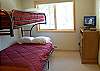 Upstairs Bunk Room with a Double on the Bottom and a Twin on Top.  Also has a flat screen TV.