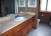 Upstairs hall bathroom with tub and shower combo.