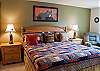 This is the first of four bedrooms in this home. This bedroom features a King Size Bed. All bedrooms have TVs.
