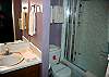 The downstairs bath has a tub/shower combo.