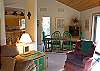 View from the living room to dining area and kitchen.  Spacious yet comfortable space for all!