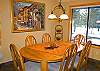 Bright dining room. Table seats six.