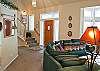 Anothr view of the living room. Nice big couch has room for everybody.