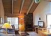 Comfortable living room to enjoy a book or good conversation.  This home has a flat screen TV.