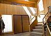 Towards the front doors and stairs going up to other rooms.  Beautiful decor!