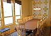 Dining room table can seat 10 with 2 more chairs available.