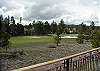Deck with view of Woodlands Golf course