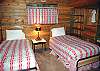 This upstairs bedroom with two Twin Beds. Added toys and books make this a perfect room for the kids!