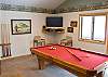 Anyone up for a game of pool or watch a movie on the flat screen?