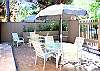 This enclosed courtyard is perfect for small family gatherings or just a private escape.