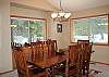 A lovely wood dining set provides the perfect backdrop for special meals and moments.