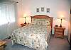 The Queen Bedroom downstairs shares a bathroom with bunk room.It has a  TV with a VHS player.