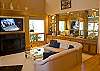 Another view of the living room with lots of comfortable seating.