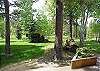 The expansive rolling lawn is open with trees and runs from the log cabin playhouse down to the river.  It is perfect for vacations, family reunions, weddings, or receptions!