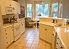 A completely equipped kitchen is ready for easy preparation of family meals.  The kitchen is open to the living room and dining room so the chef is never left out of the fun.