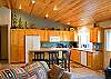 Large bright and open kitchen with a breakfast bar that seats 3.