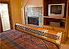 Gas fireplace and television in the master bedroom