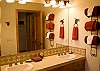 King Master Bathroom with a shower, 2 sinks and a walk-in closet.