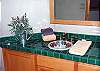 All bathrooms have these (look like hand crafted) ceramic-type sinks.