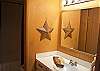 Downstairs hall bathroom with shower tub.